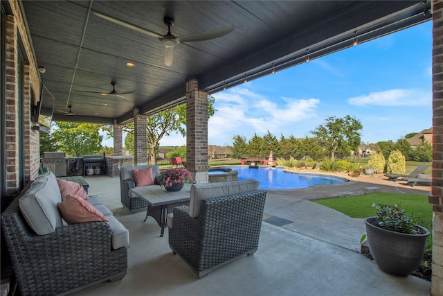 view of patio / terrace featuring an outdoor pool and grilling area