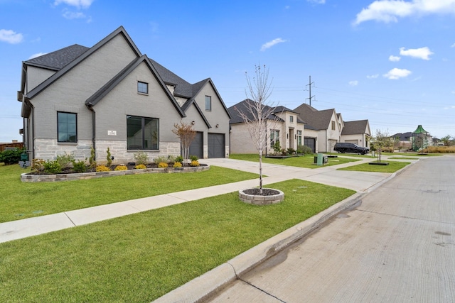 3340 Cabin Crest Pl, Frisco, TX 75033 - french country style house with concrete driveway, stone siding, a shingled roof, a front yard, and a residential view