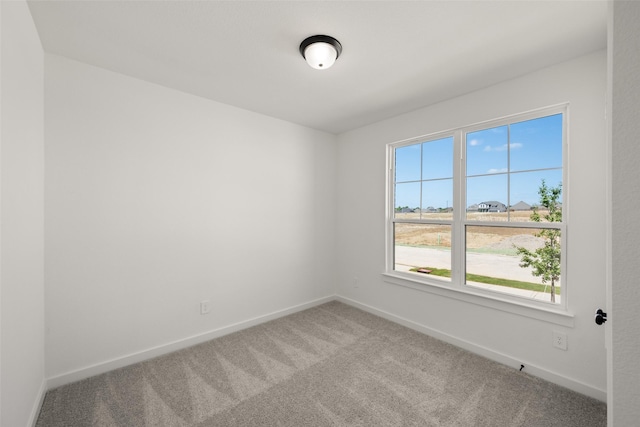 216 Whitetail Dr, Aledo, TX 76008 - spare room featuring carpet and baseboards