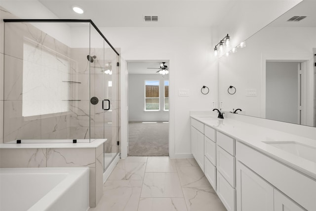 216 Whitetail Dr, Aledo, TX 76008 - bathroom featuring a garden tub, ceiling fan, double vanity, a shower stall, and marble finish flooring