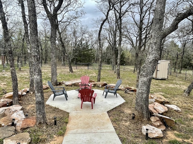 exterior space featuring a patio and fence