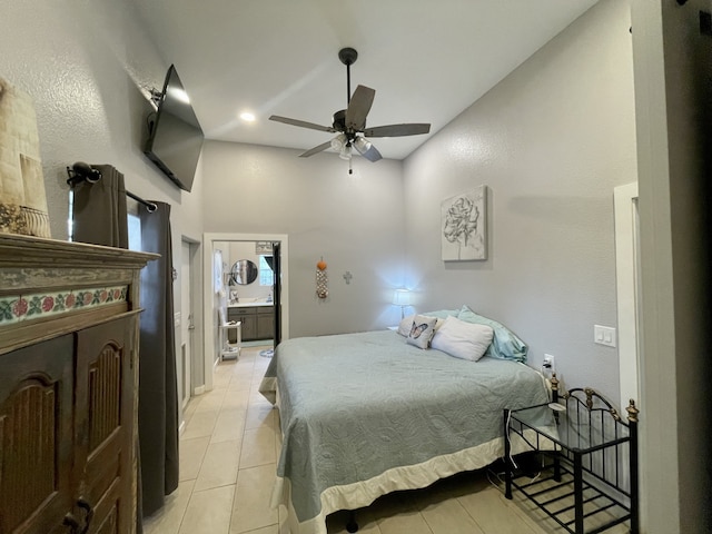bedroom with ensuite bathroom and ceiling fan