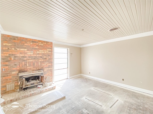 210 Wise St, Clyde, TX 79510 - unfurnished living room featuring baseboards, wood finished floors, crown molding, and wood ceiling