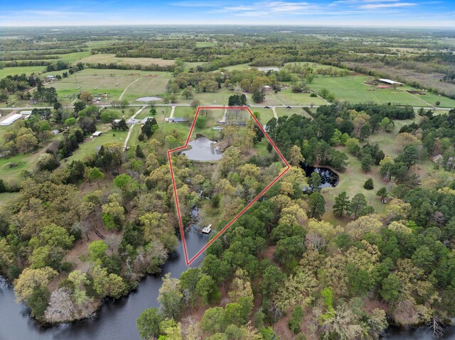 2223 Farm Rd Unit 115, Mount Vernon, TX 75457 - birds eye view of property featuring a water view and a rural view