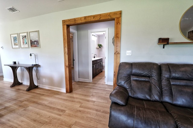 2432 Cottondale Rd, Springtown, TX 76082 - living area featuring baseboards and light wood finished floors
