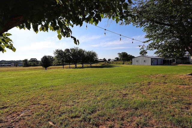 2432 Cottondale Rd, Springtown, TX 76082 - view of green lawn featuring a pole building and an outdoor structure