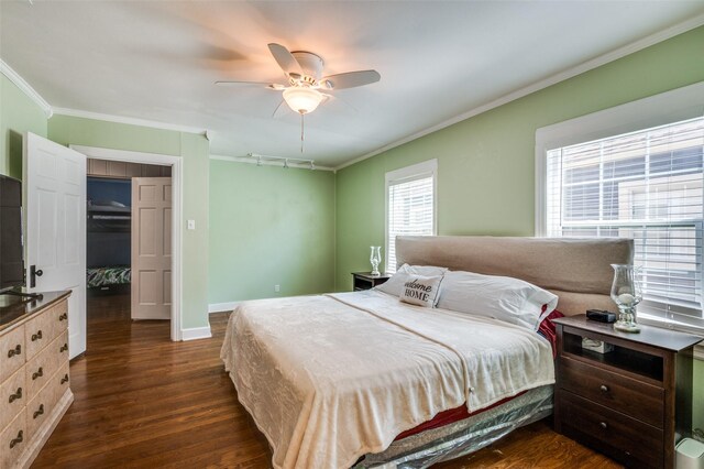 3929 Collinwood Ave, Fort Worth, TX 76107 - bedroom with crown molding, dark wood-style flooring, ceiling fan, and baseboards