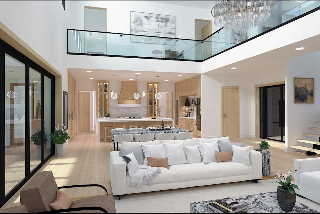 8222 San Leandro Dr, Dallas, TX 75218 - living area with a high ceiling, light wood-type flooring, stairs, recessed lighting, and a chandelier