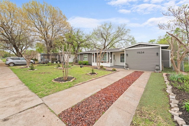 11534 Fernald Ave, Dallas, TX 75218 - ranch-style house featuring board and batten siding