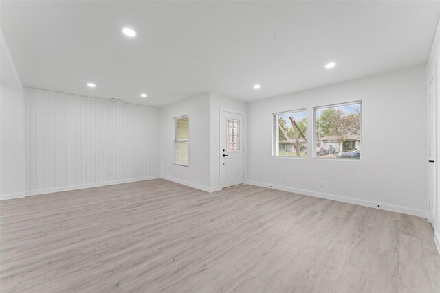 11534 Fernald Ave, Dallas, TX 75218 - spare room with light wood finished floors, recessed lighting, and baseboards
