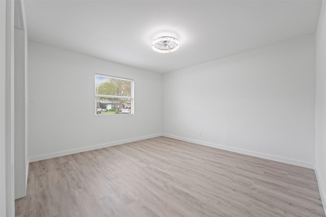 11534 Fernald Ave, Dallas, TX 75218 - unfurnished room with wood finished floors and baseboards
