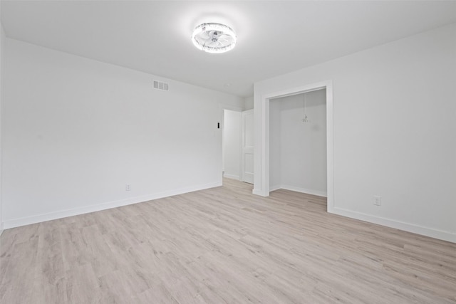 11534 Fernald Ave, Dallas, TX 75218 - empty room featuring light wood finished floors and baseboards