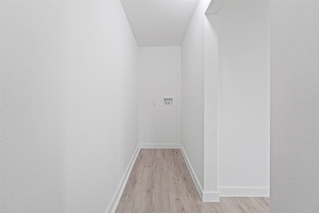 11534 Fernald Ave, Dallas, TX 75218 - hallway with light wood-type flooring and baseboards