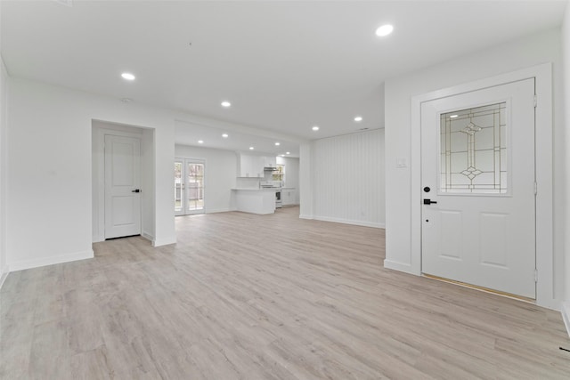 11534 Fernald Ave, Dallas, TX 75218 - unfurnished living room featuring light wood finished floors, recessed lighting, and baseboards
