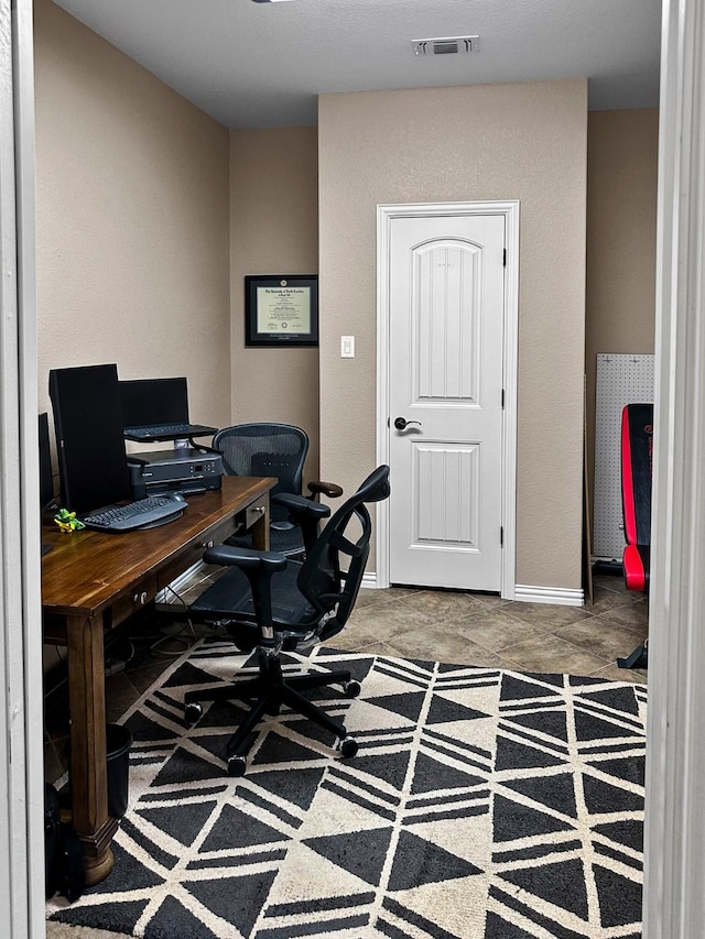 office featuring baseboards
