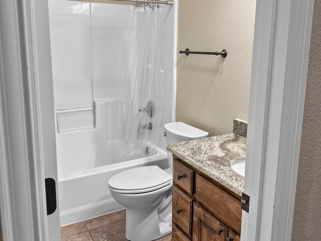 300 Cleve Cole Rd, Denison, TX 75021 - full bath with a textured wall, toilet, shower / bath combo, vanity, and tile patterned floors