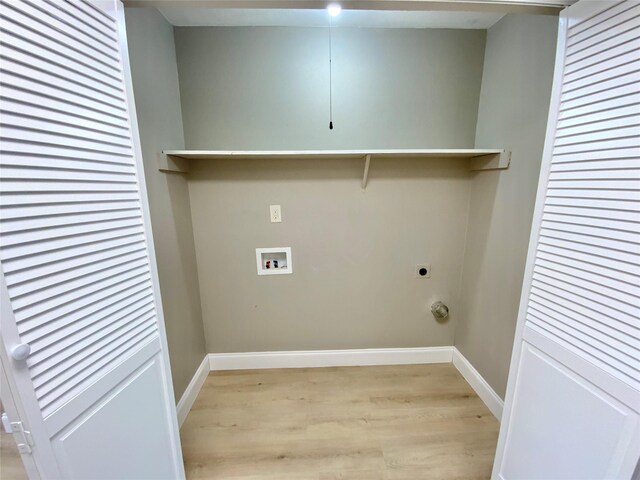 1332 Burmeister Rd, Fort Worth, TX 76134 - washroom featuring hookup for an electric dryer, hookup for a washing machine, baseboards, light wood finished floors, and laundry area