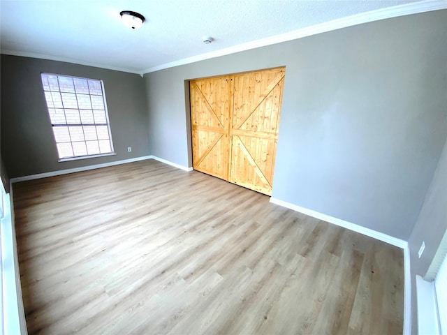 1332 Burmeister Rd, Fort Worth, TX 76134 - unfurnished bedroom with baseboards, wood finished floors, and ornamental molding
