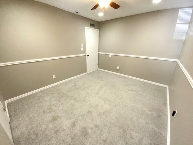 1332 Burmeister Rd, Fort Worth, TX 76134 - carpeted empty room with baseboards, visible vents, and a ceiling fan