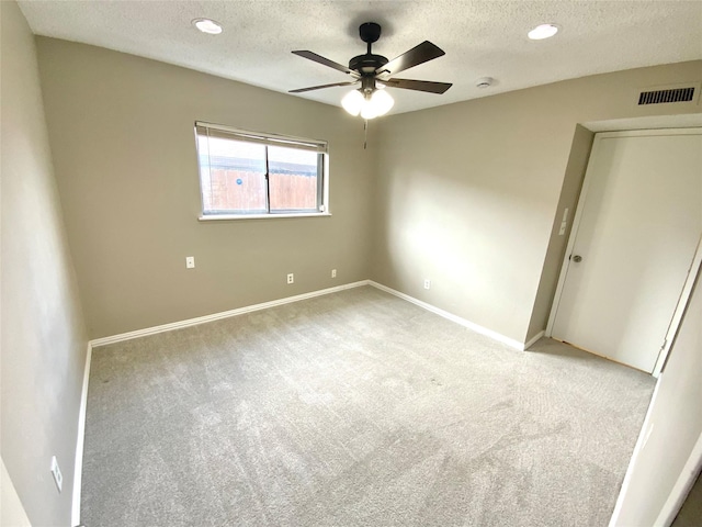 1332 Burmeister Rd, Fort Worth, TX 76134 - carpeted spare room featuring baseboards, visible vents, a textured ceiling, and a ceiling fan