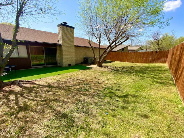1332 Burmeister Rd, Fort Worth, TX 76134 - view of yard featuring a fenced backyard and central air condition unit