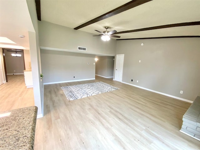 1332 Burmeister Rd, Fort Worth, TX 76134 - unfurnished living room with lofted ceiling with beams, ceiling fan with notable chandelier, baseboards, and visible vents