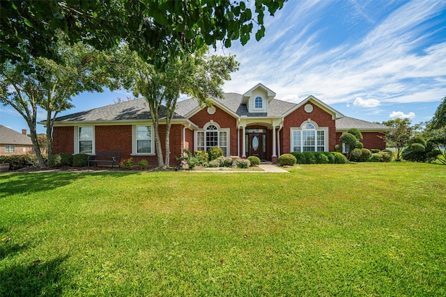 1022 High Meadow Dr, Mount Vernon, TX 75457 - view of front facade with brick siding, a shingled roof, and a front yard