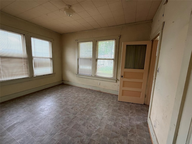 empty room with stone finish flooring