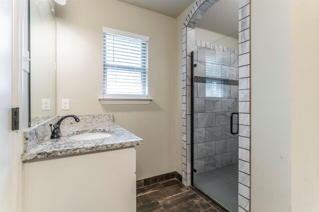 2024 Castleberry Cut-Off Rd, Fort Worth, TX 76114 - bathroom featuring vanity, baseboards, and a shower stall