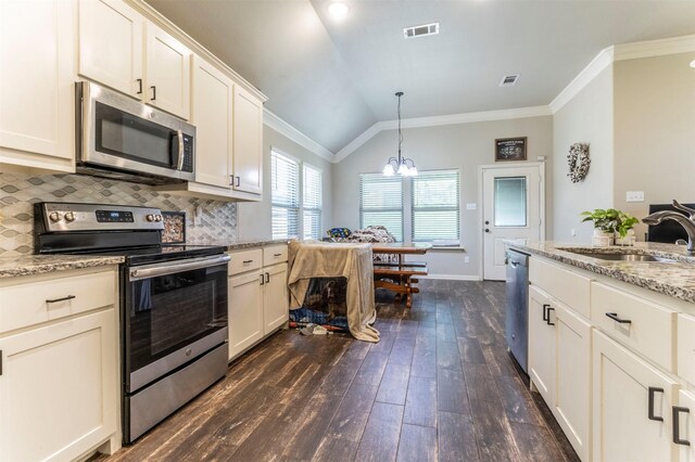 2024 Castleberry Cut-Off Rd, Fort Worth, TX 76114 - kitchen with appliances with stainless steel finishes, dark wood-type flooring, lofted ceiling, a sink, and backsplash