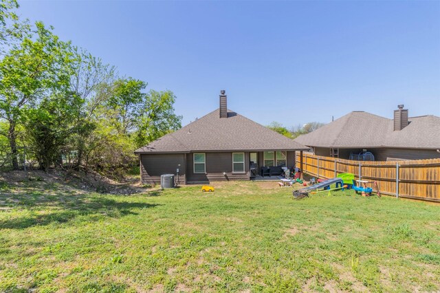 2024 Castleberry Cut-Off Rd, Fort Worth, TX 76114 - rear view of property with cooling unit, a chimney, a fenced backyard, a yard, and a patio area