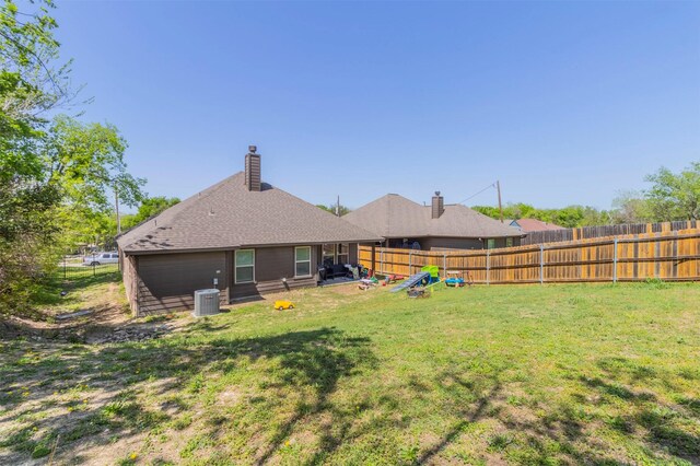 2024 Castleberry Cut-Off Rd, Fort Worth, TX 76114 - view of yard featuring a fenced backyard, a garage, and central air condition unit
