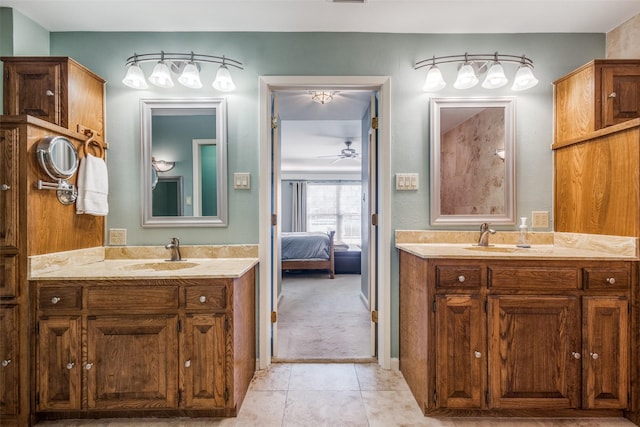 328 S Jackson Ave, Justin, TX 76247 - bathroom featuring two vanities, ensuite bathroom, ceiling fan, and tile patterned flooring