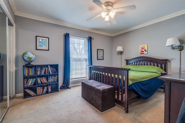328 S Jackson Ave, Justin, TX 76247 - carpeted bedroom with crown molding, ceiling fan, baseboards, and a closet