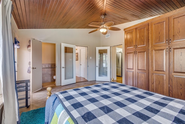328 S Jackson Ave, Justin, TX 76247 - unfurnished bedroom with wooden ceiling, freestanding refrigerator, french doors, light tile patterned floors, and vaulted ceiling