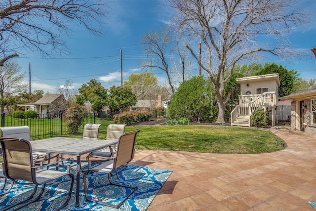 328 S Jackson Ave, Justin, TX 76247 - view of patio with stairway and outdoor dining area