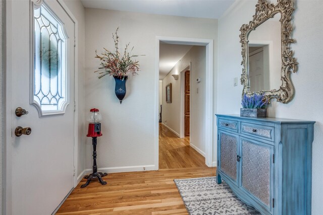 328 S Jackson Ave, Justin, TX 76247 - entryway featuring light wood-style floors and baseboards
