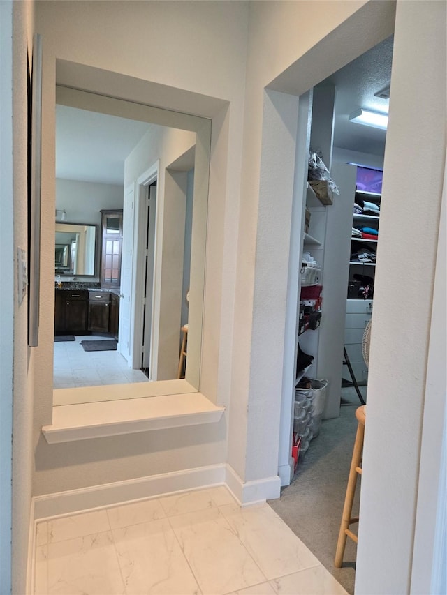1214 Norwood St, Mansfield, TX 76063 - hall with baseboards and marble finish floor