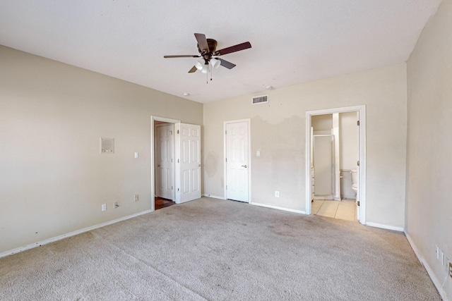 102 Cedar Dr, Oak Leaf, TX 75154 - unfurnished bedroom with light colored carpet, baseboards, ensuite bath, ceiling fan, and visible vents