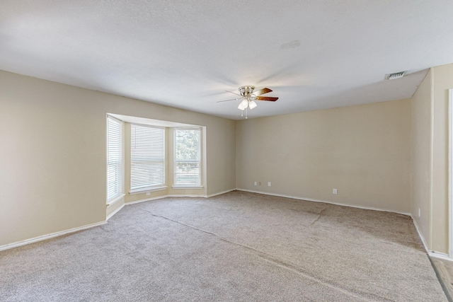 102 Cedar Dr, Oak Leaf, TX 75154 - empty room featuring baseboards, visible vents, ceiling fan, and carpet flooring