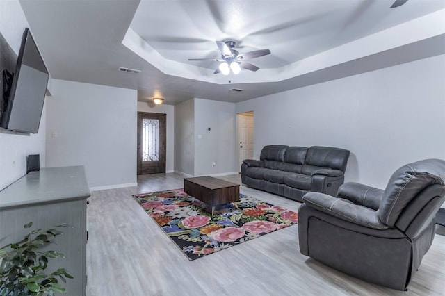 509 Brockett St, Aubrey, TX 76227 - living area with a ceiling fan, light wood finished floors, a raised ceiling, and baseboards