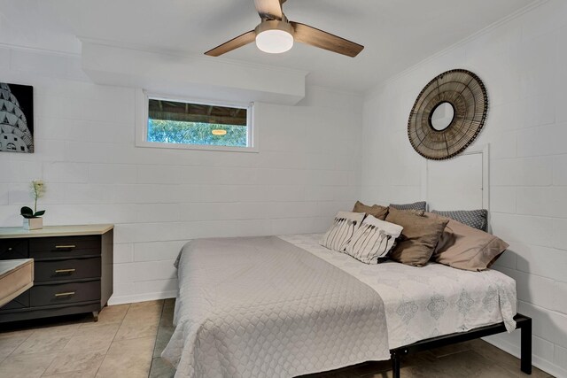 4901 Fairway Ct, De Cordova, TX 76049 - bedroom with concrete block wall, ornamental molding, and a ceiling fan
