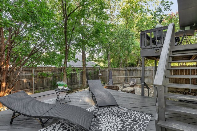 4901 Fairway Ct, De Cordova, TX 76049 - deck featuring stairs and a fenced backyard