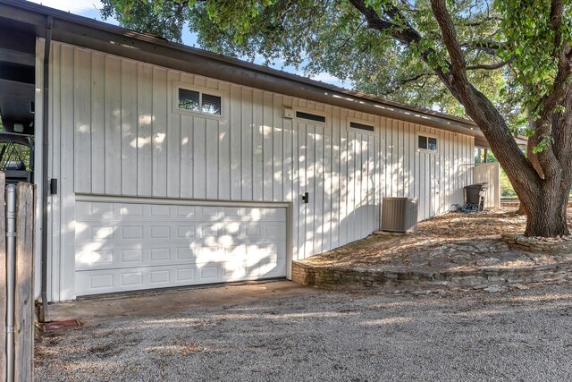4901 Fairway Ct, De Cordova, TX 76049 - garage featuring central AC