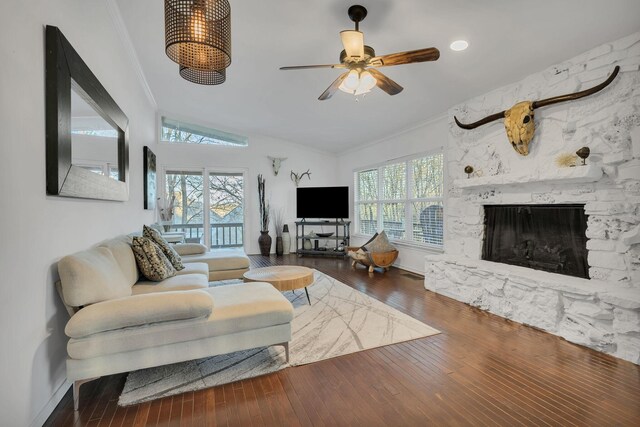 4901 Fairway Ct, De Cordova, TX 76049 - living room with hardwood / wood-style floors, ornamental molding, baseboards, a ceiling fan, and a fireplace