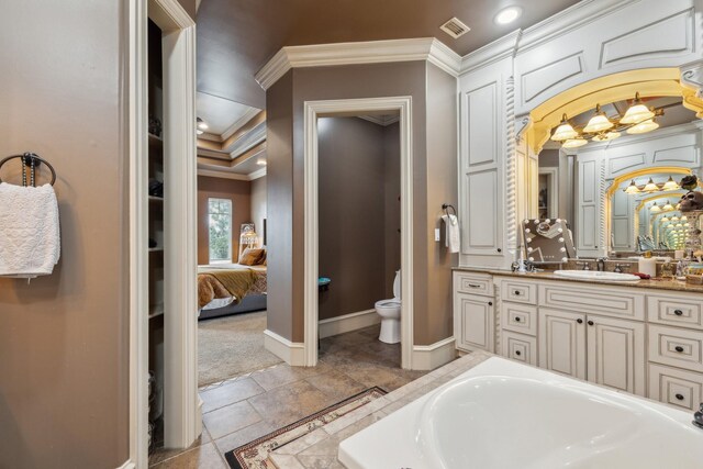 2901 Stewart Way, Tyler, TX 75709 - ensuite bathroom with visible vents, baseboards, toilet, crown molding, and vanity