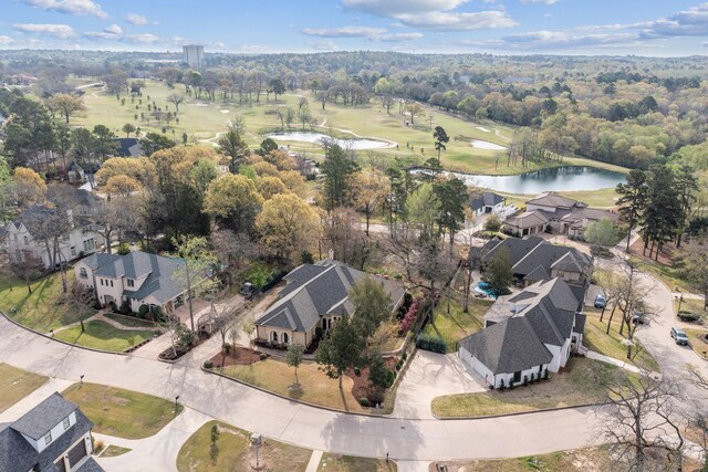 2901 Stewart Way, Tyler, TX 75709 - view of front of property with a front yard, stucco siding, and stone siding