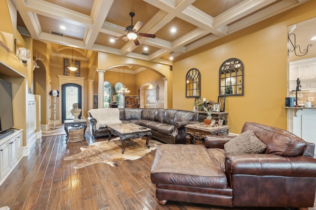 2901 Stewart Way, Tyler, TX 75709 - living area with beamed ceiling, dark wood finished floors, ornate columns, arched walkways, and a ceiling fan