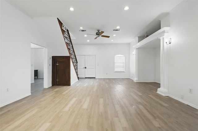 unfurnished living room with stairs, recessed lighting, light wood finished floors, visible vents, and a ceiling fan