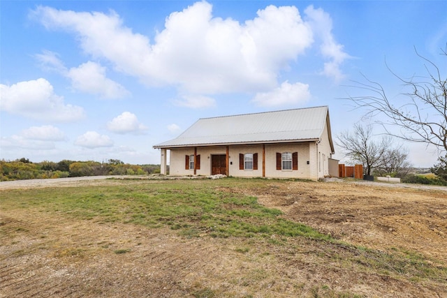 view of front of house with metal roof